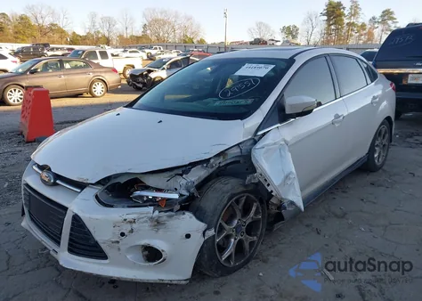 2012 Ford Focus Titanium z USA, uszkodzony, nr VIN 1FAHP3J20CL428059
